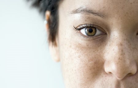 Het gezicht van een Aziatische vrouw